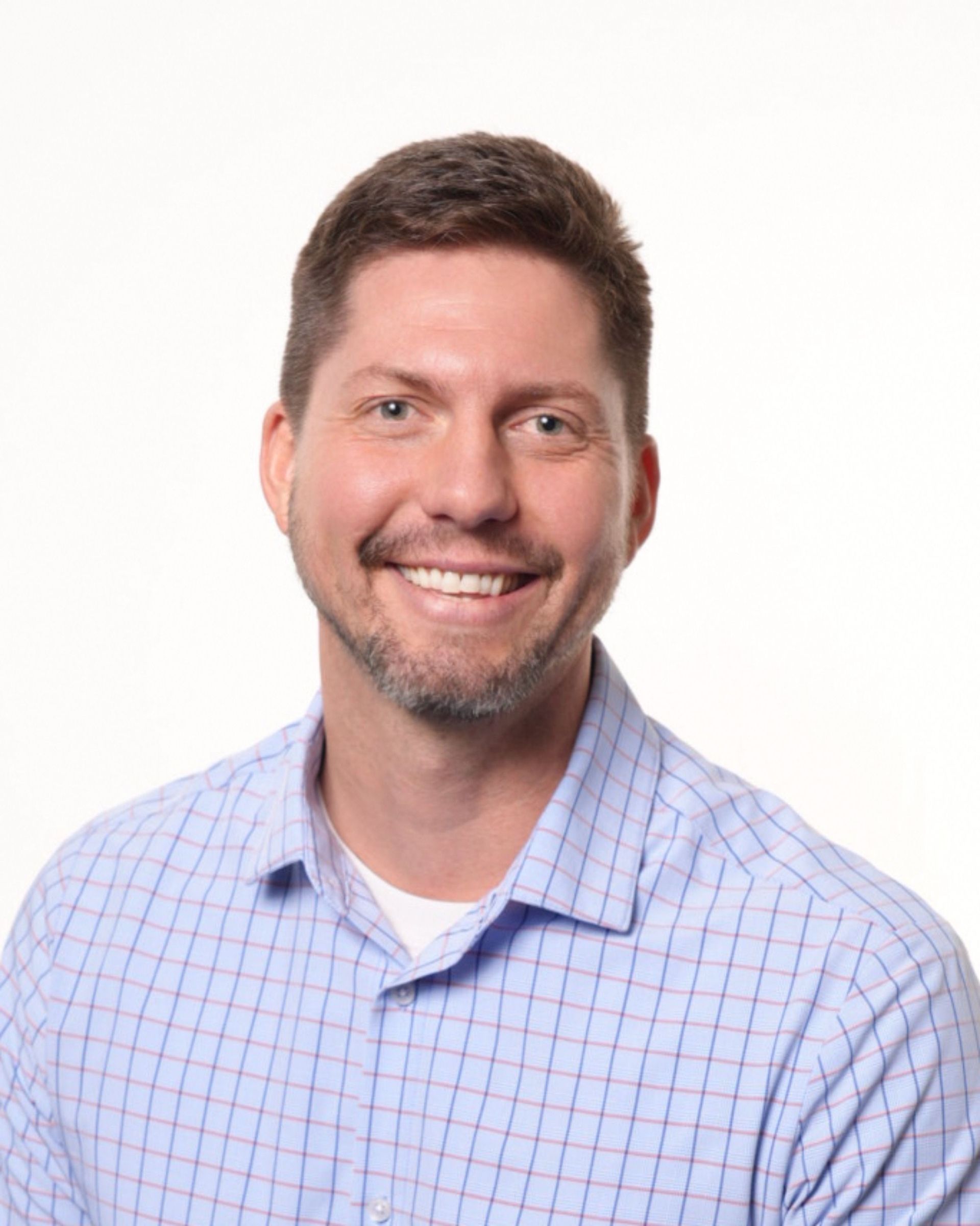 Portrait of Tyler Moberg, founder of Amplified Impact.
